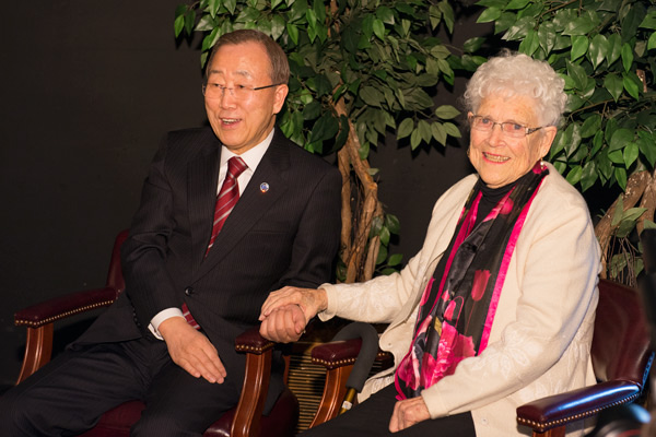 UN Secretary-General Ban Ki-moon holds hands with his 'American Mother,' Libba Patterson when they reunited in a meeting before his speech.