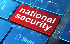 keyboard with words 'national security' on return key